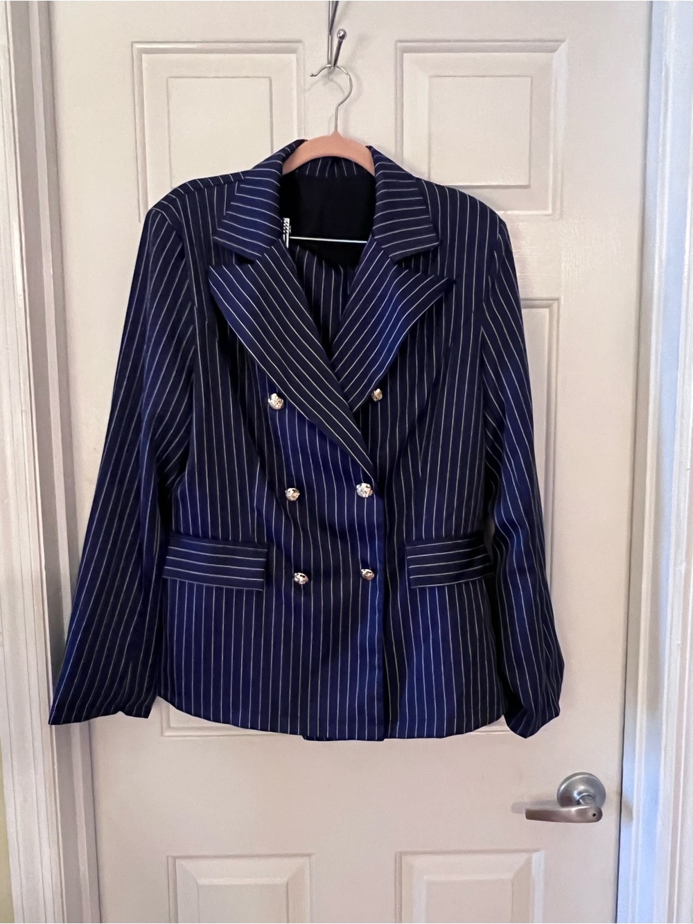 Double-Breasted Navy Pinstripe Blazer  and pant suit. Women